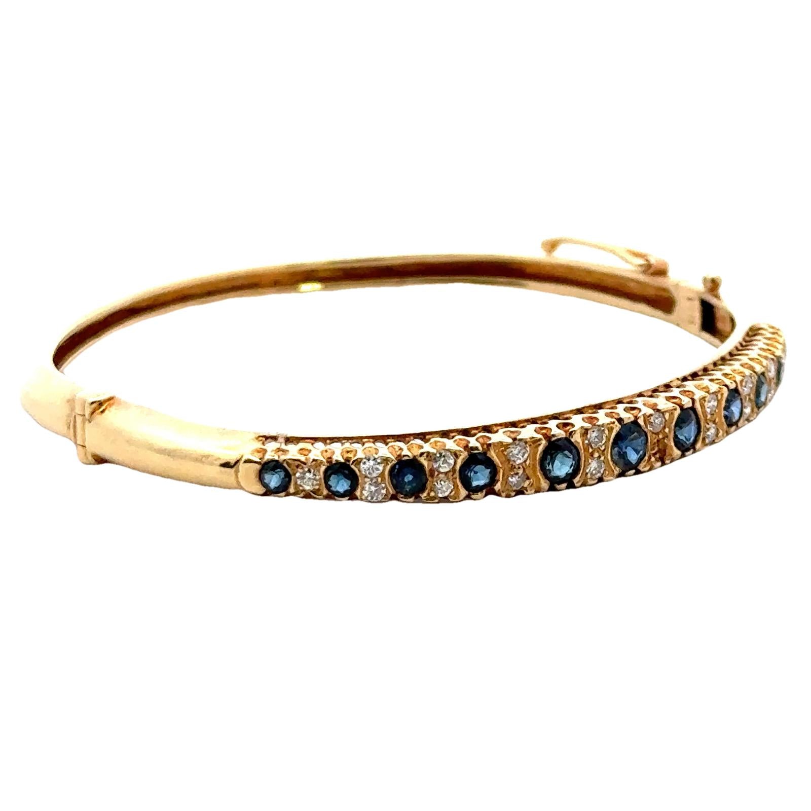 Diamond Sapphire 14 Karat Yellow Gold Hinged Bangle Bracelet