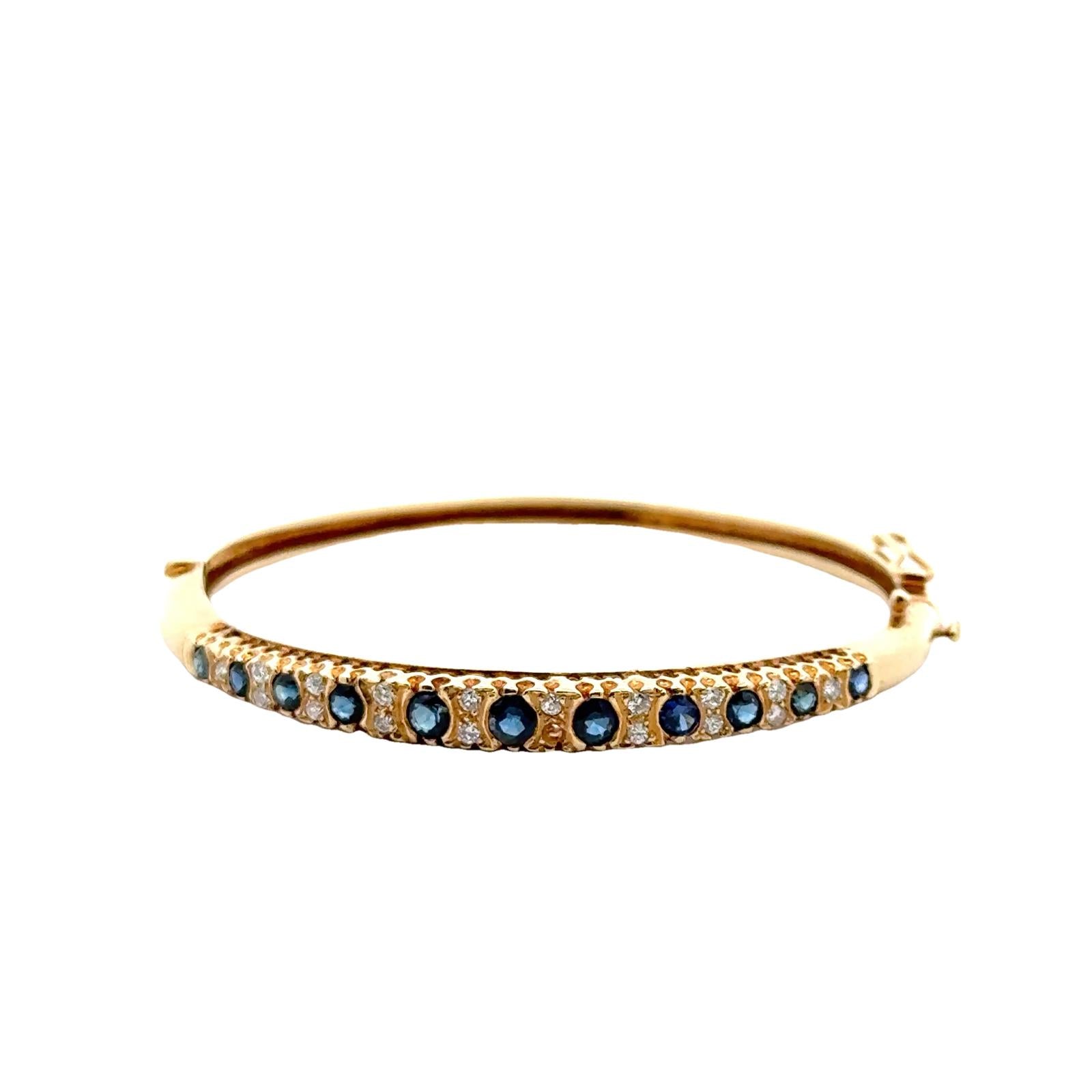 Diamond Sapphire 14 Karat Yellow Gold Hinged Bangle Bracelet