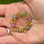 1950's Diamond Ruby Emerald Sapphire 18 Karat Yellow Gold Flower Circle Brooch