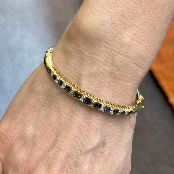 Diamond Sapphire 14 Karat Yellow Gold Hinged Bangle Bracelet